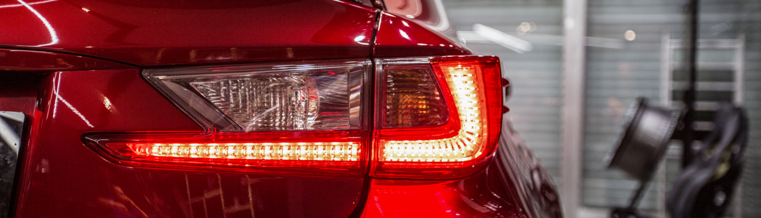 back-red-lights-red-sport-car